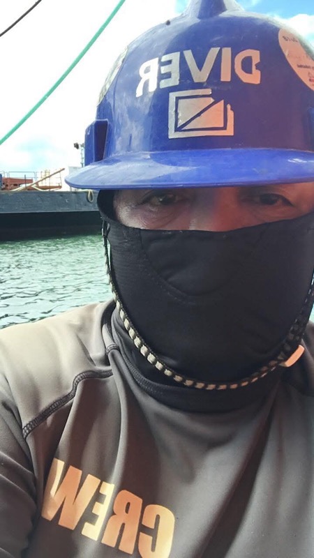 Crew member with DIVER helmet